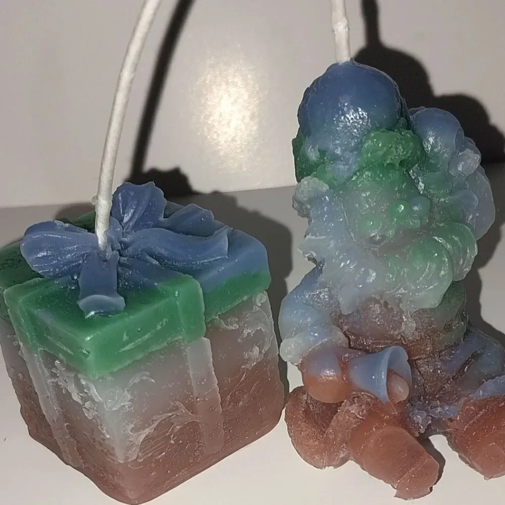 Hand crafted 2 piece holiday Santa's present candle set
